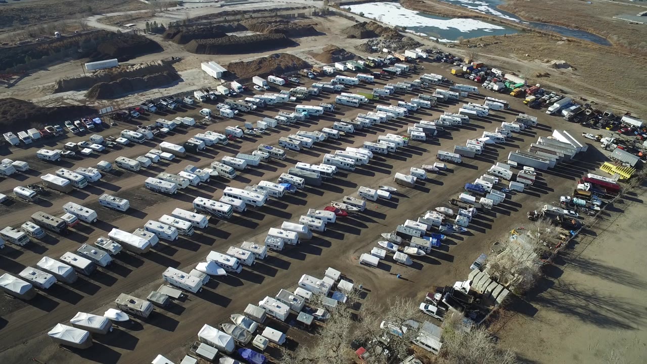 High angle view across a large RV and trailer storage yard.
