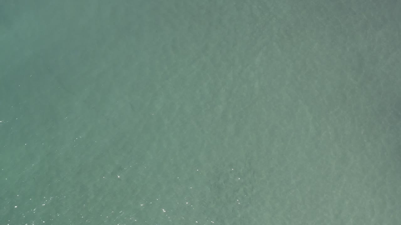 Greenish clear water with soft wave texture
