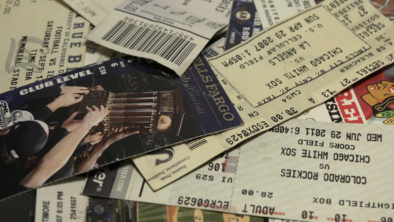 A slightly different close-up section shows layered paper tickets with readable rows of venue-style admission text, barcodes, and repeated pass cards, with no visible people.