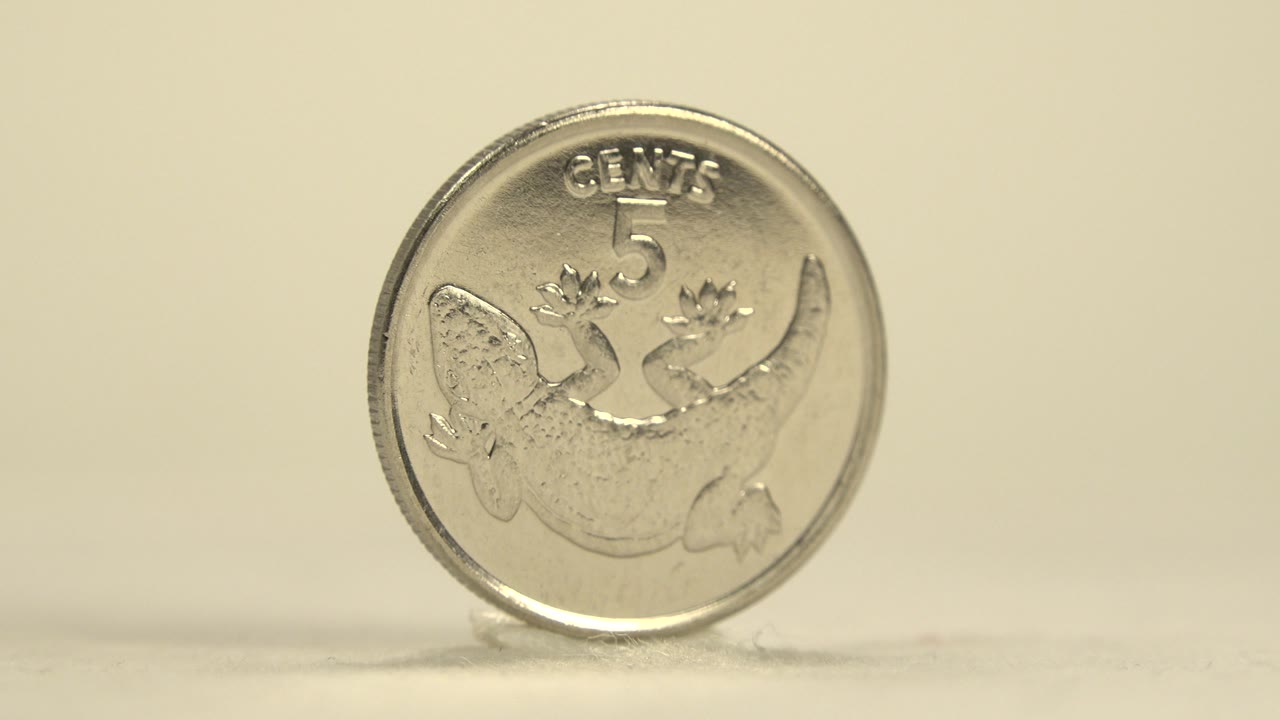 Front of a Kiribati 5 cents coin fills the frame.