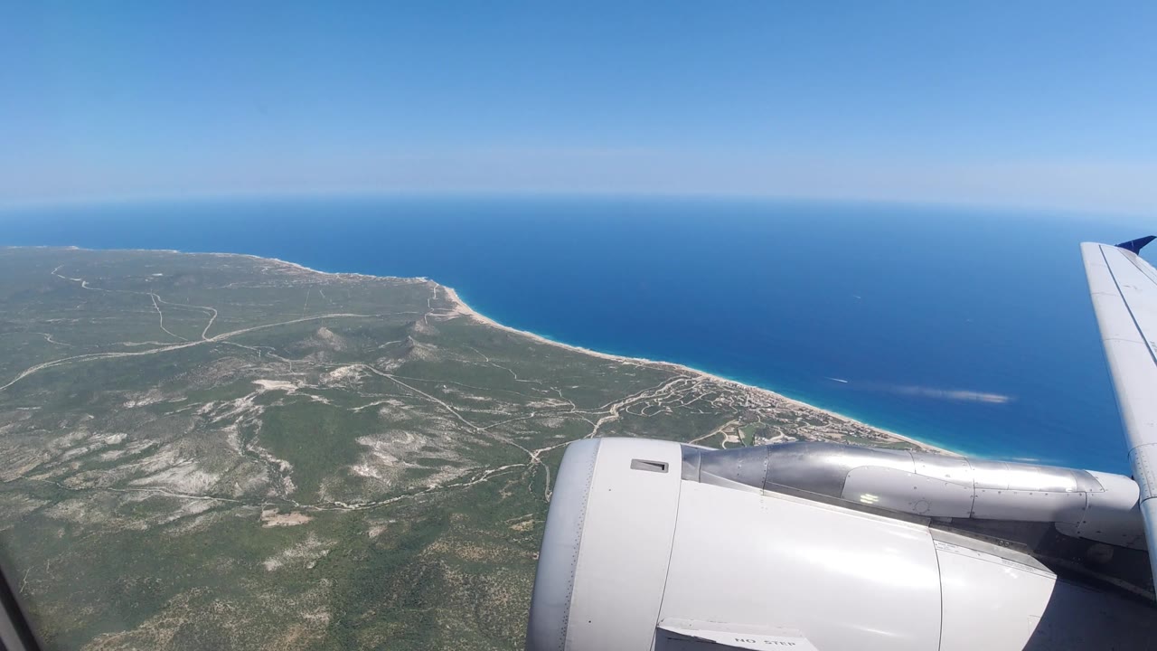 Aircraft engine over coastal land and open water