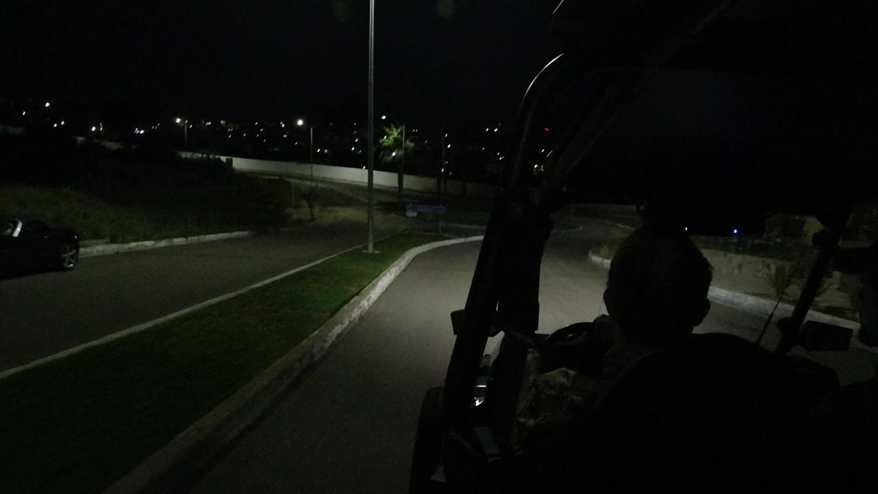 Dark road ahead from inside a vehicle at night