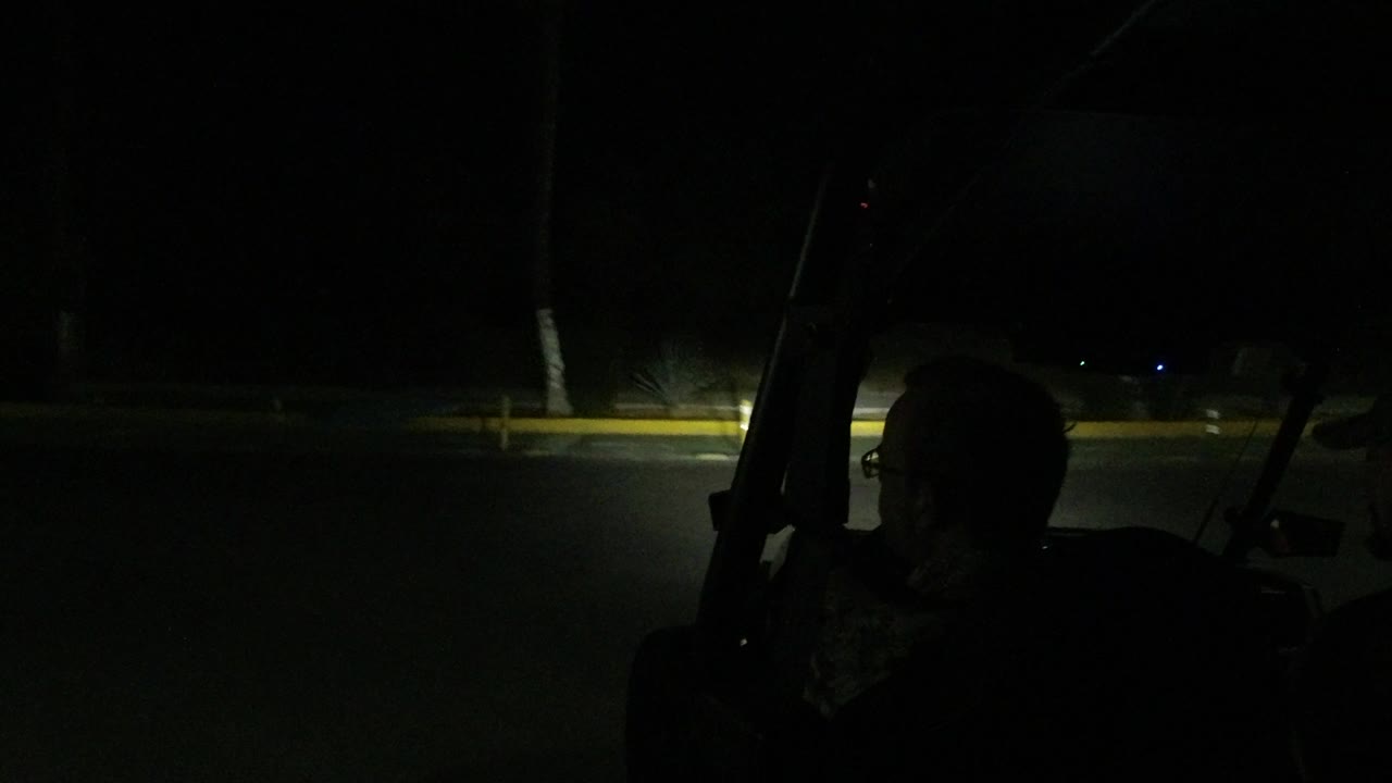Dark road ahead from inside a vehicle at night