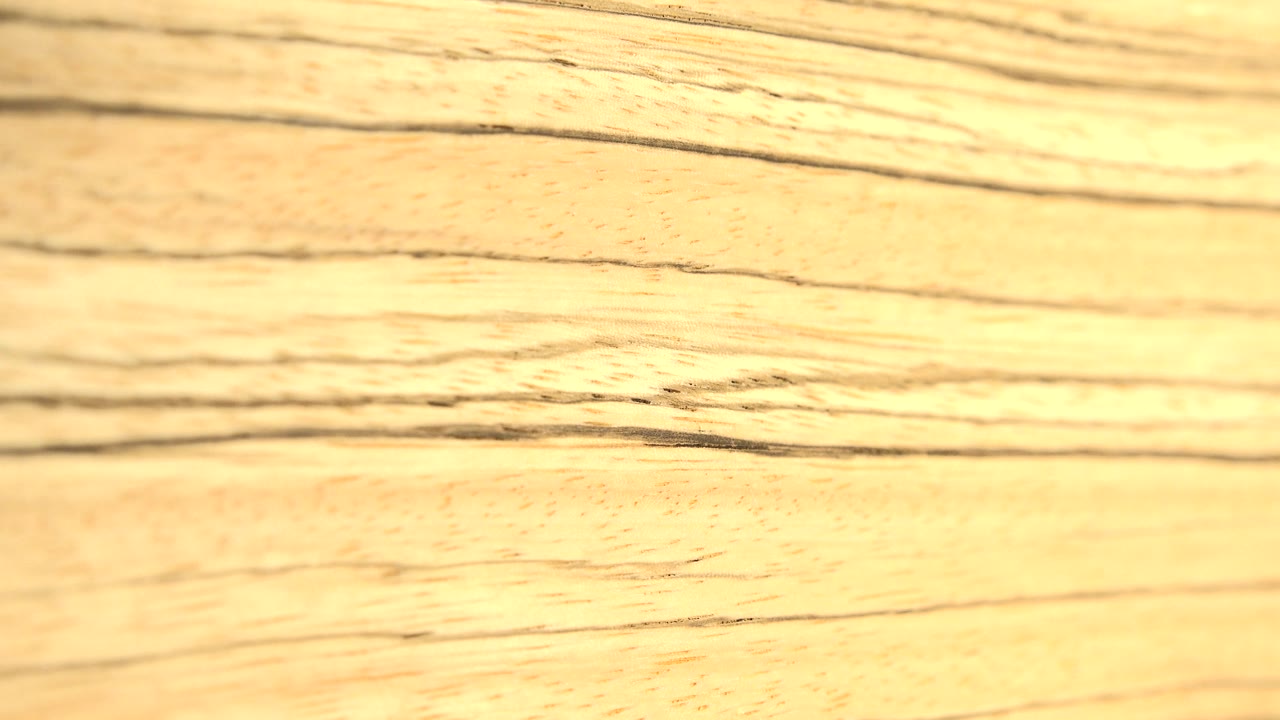 Bright golden board grain in soft light