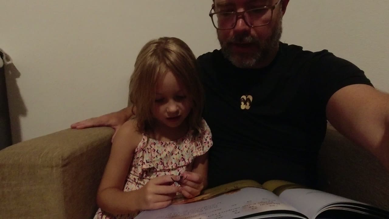 One second in, the young girl looks down toward her hands while the adult man remains partly cropped beside her in the Los Cabos home interior.