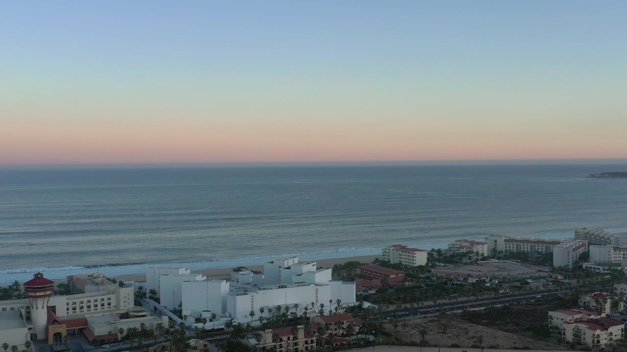 Ocean horizon above large hotels near the beach