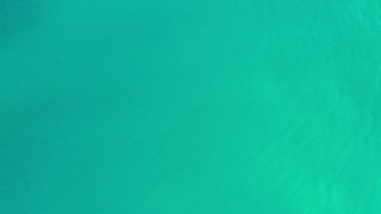 Bright turquoise water with subtle surface texture