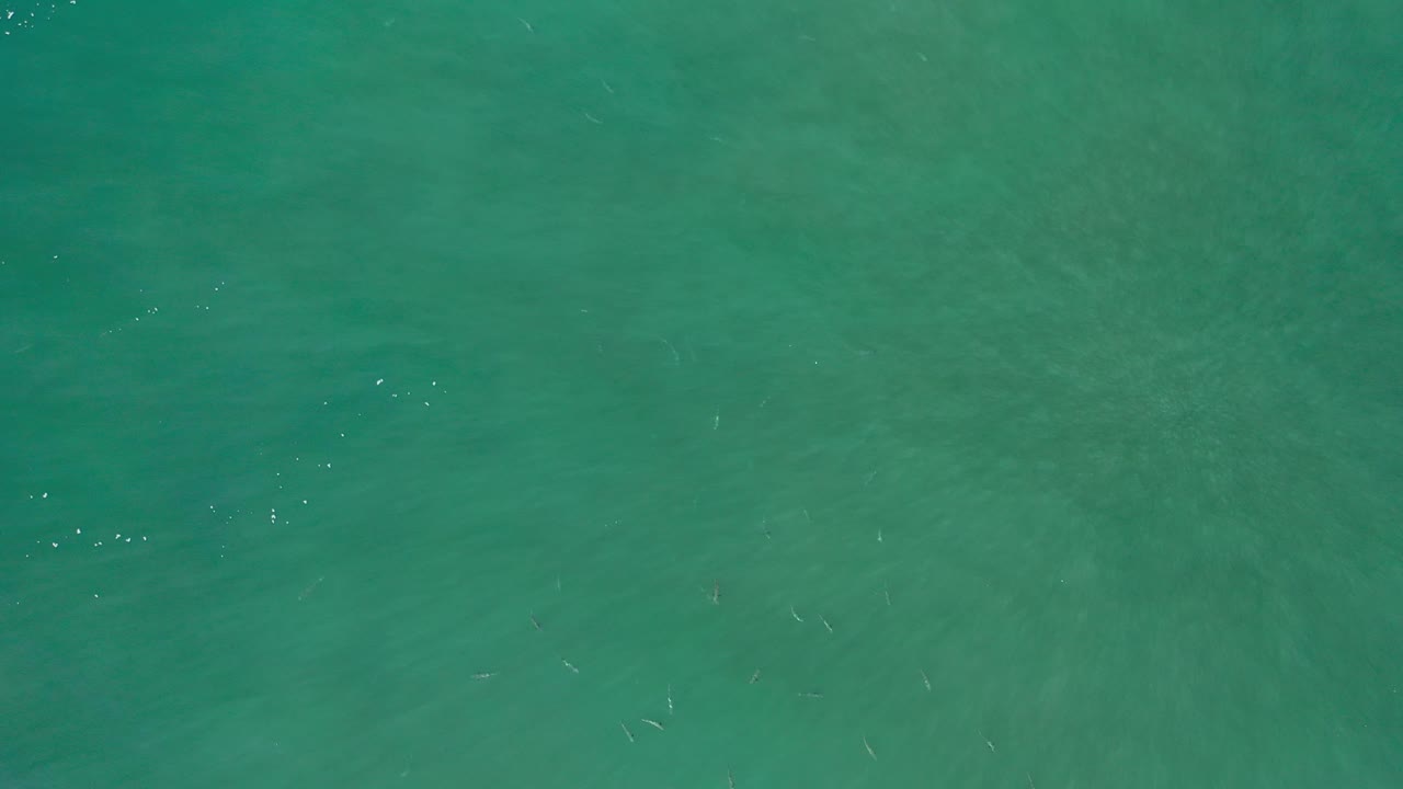 Clear ocean water with faint underwater patterns