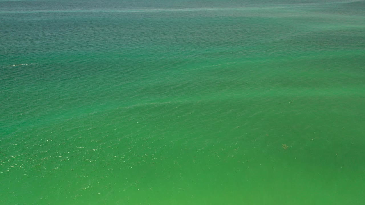 Calm ocean water with darker horizontal bands
