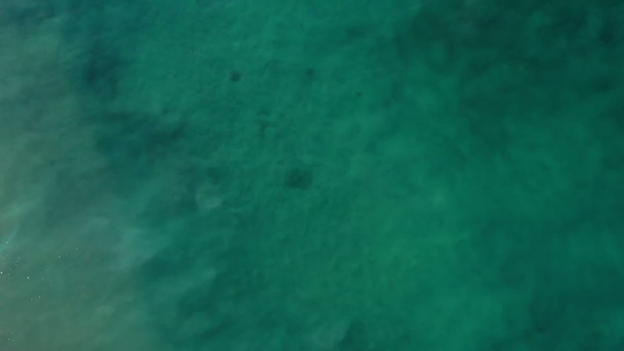 Green ocean surface seen from above
