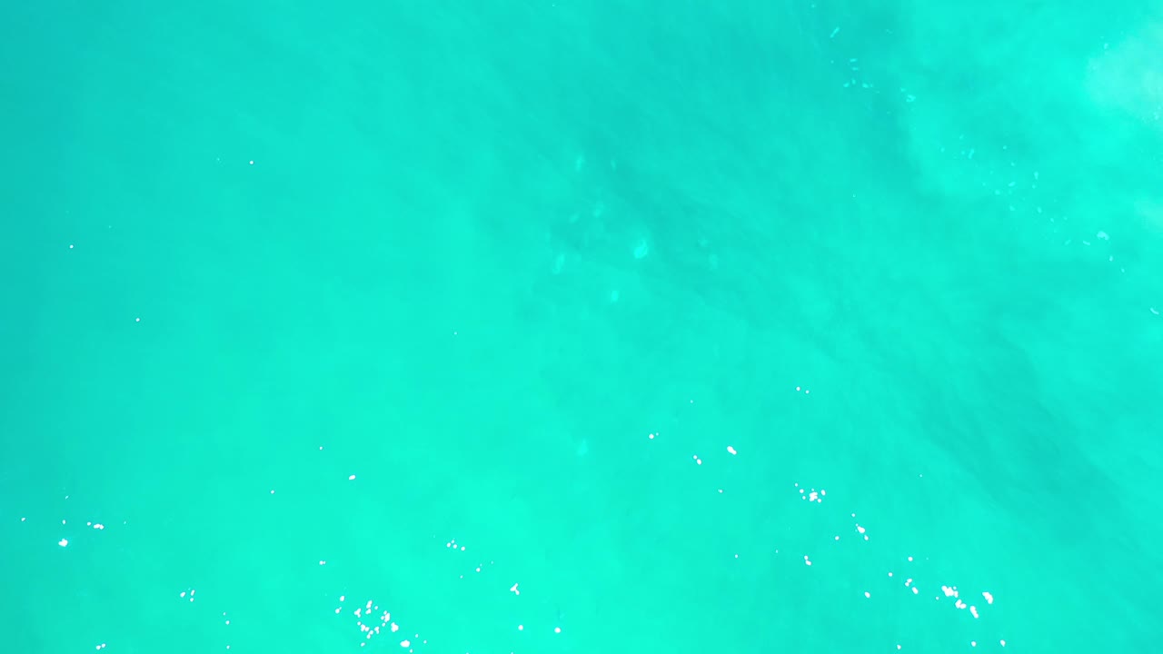 Open turquoise water with faint ripples