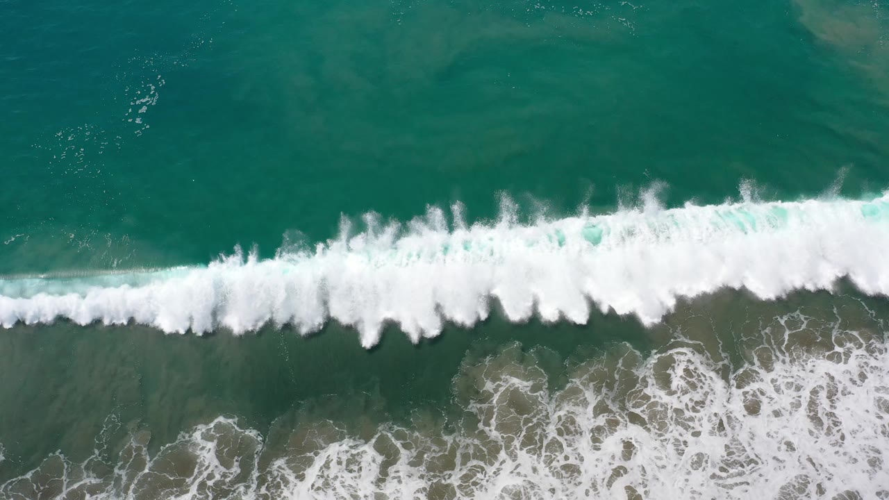Breaking wave thickening over shallow water