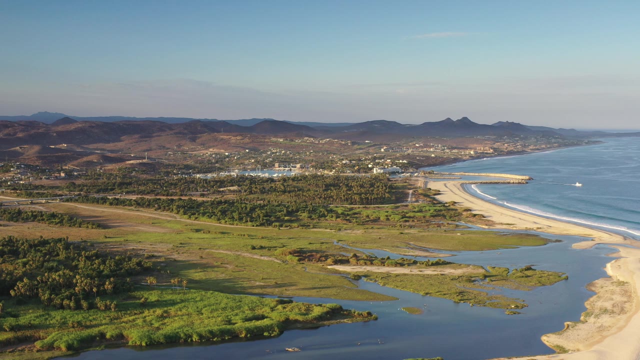 Coastal lagoon and beach seen from above.