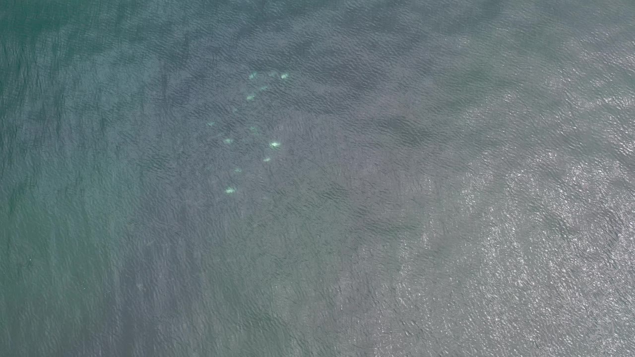 Overhead ocean water with bright reflection patch