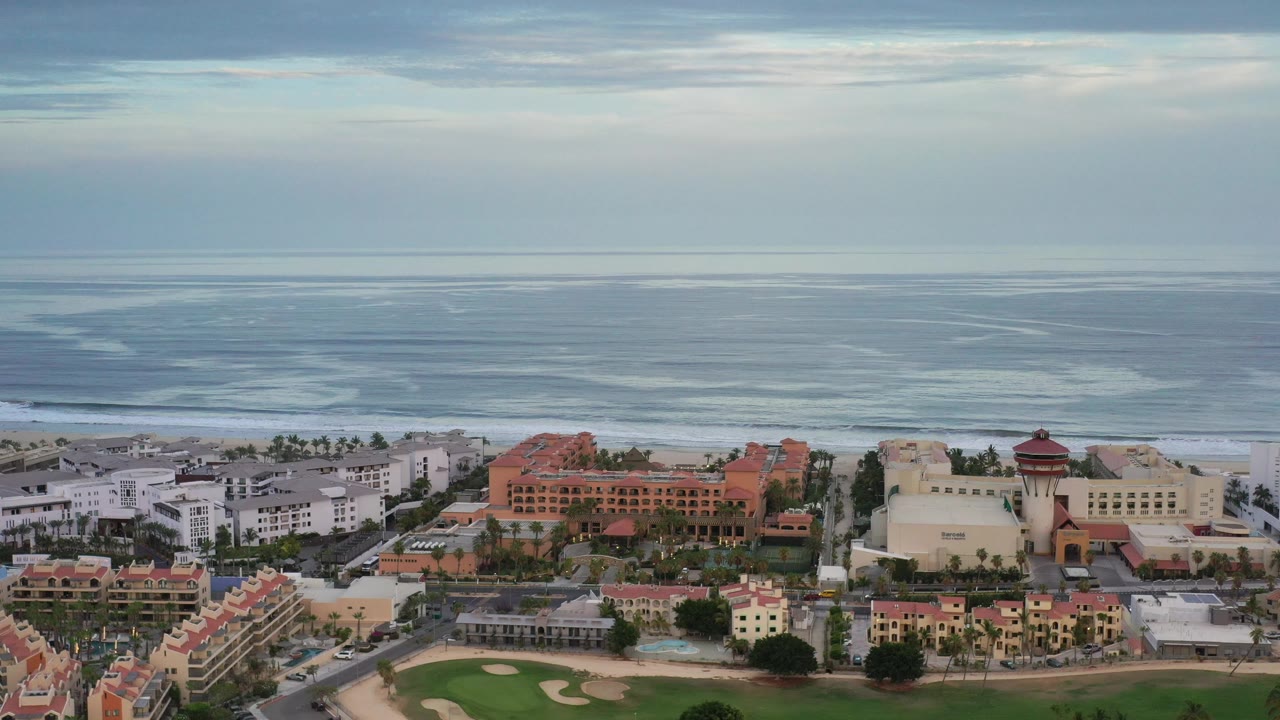 Beachfront properties with a tower structure facing the ocean