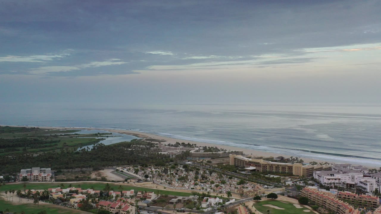 Aerial view of beachfront resort area beside ocean