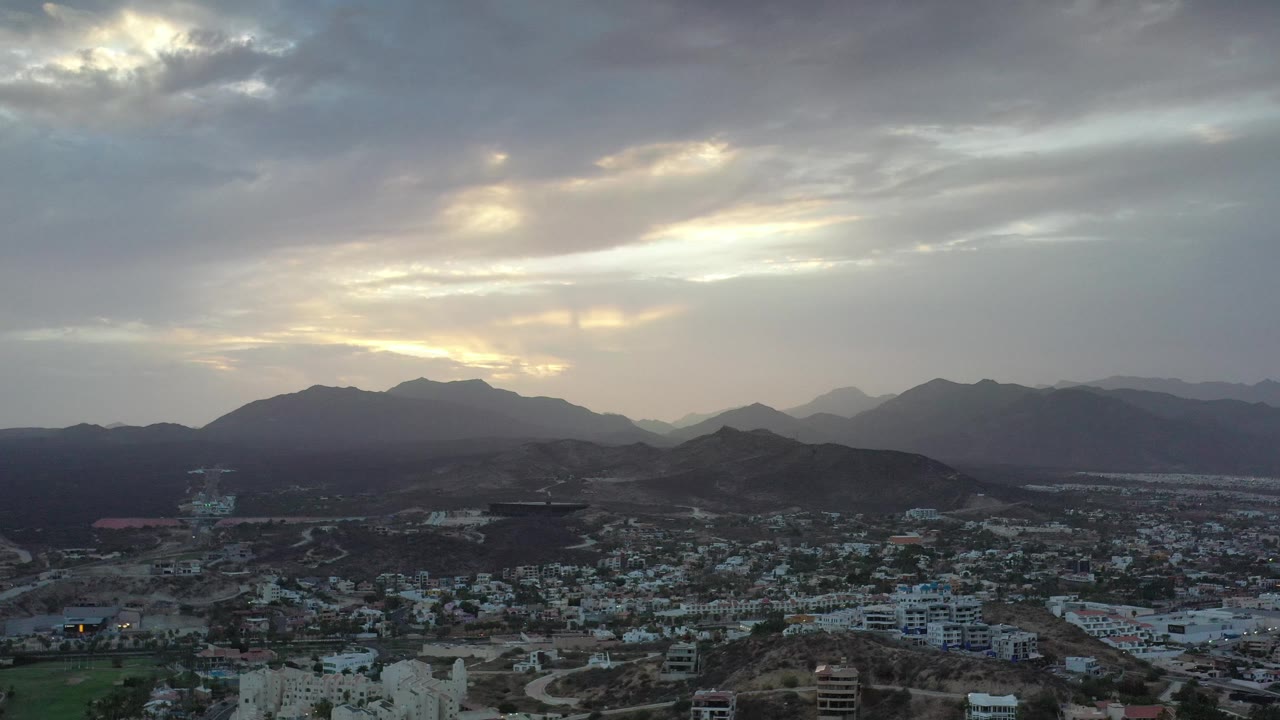 Distant hills and town at dusk