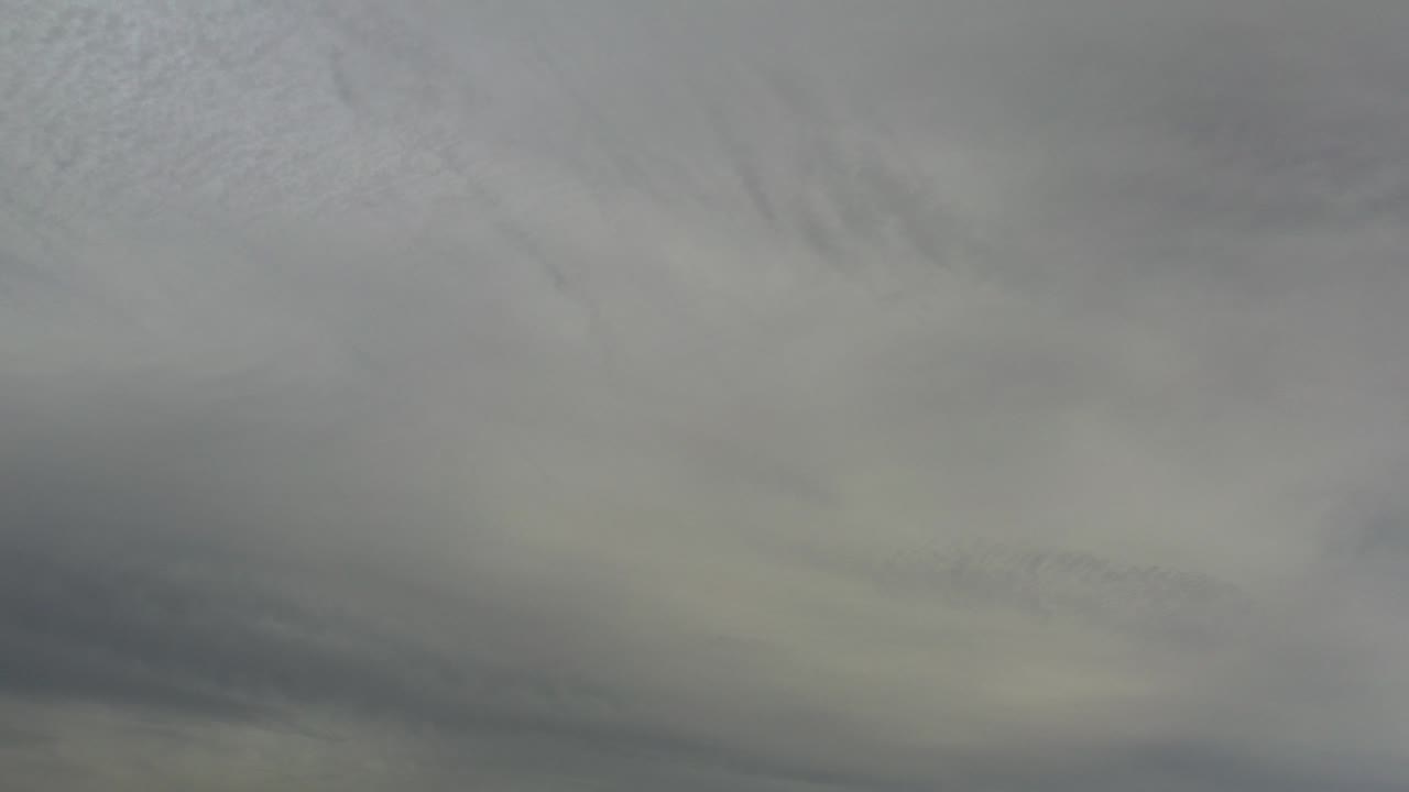 Gray and white cloud cover fills the opening frame of this Los Cabos, Mexico sky clip, with no horizon and no visible people.