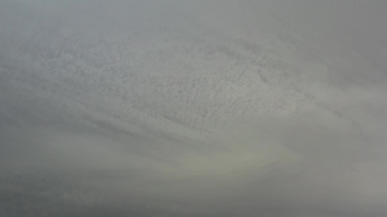 Soft gray abstract surface with faint diagonal texture