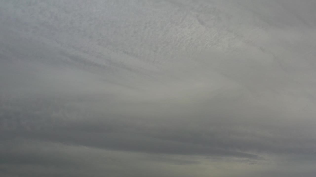 Gray storm clouds with faint pale light