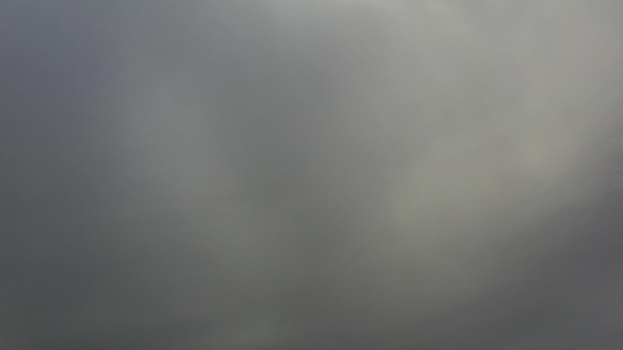Heavy gray sky with a pale cloud break.