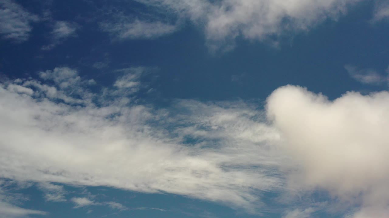 White cloud mass near the right edge of blue sky.