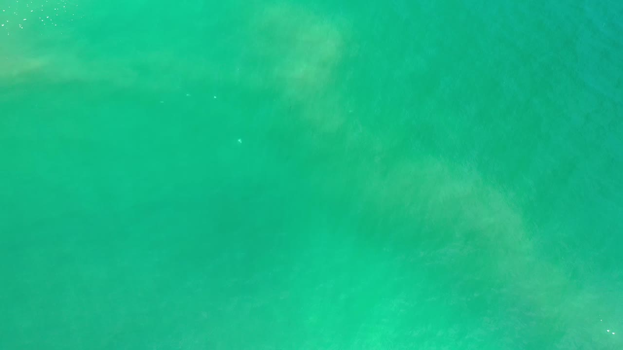 Turquoise sea water seen from above