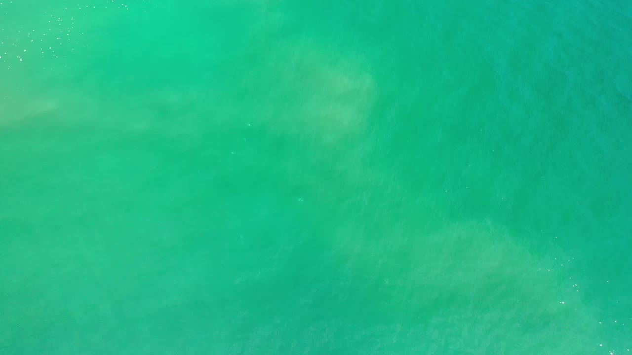 Blue-green ocean water seen from above