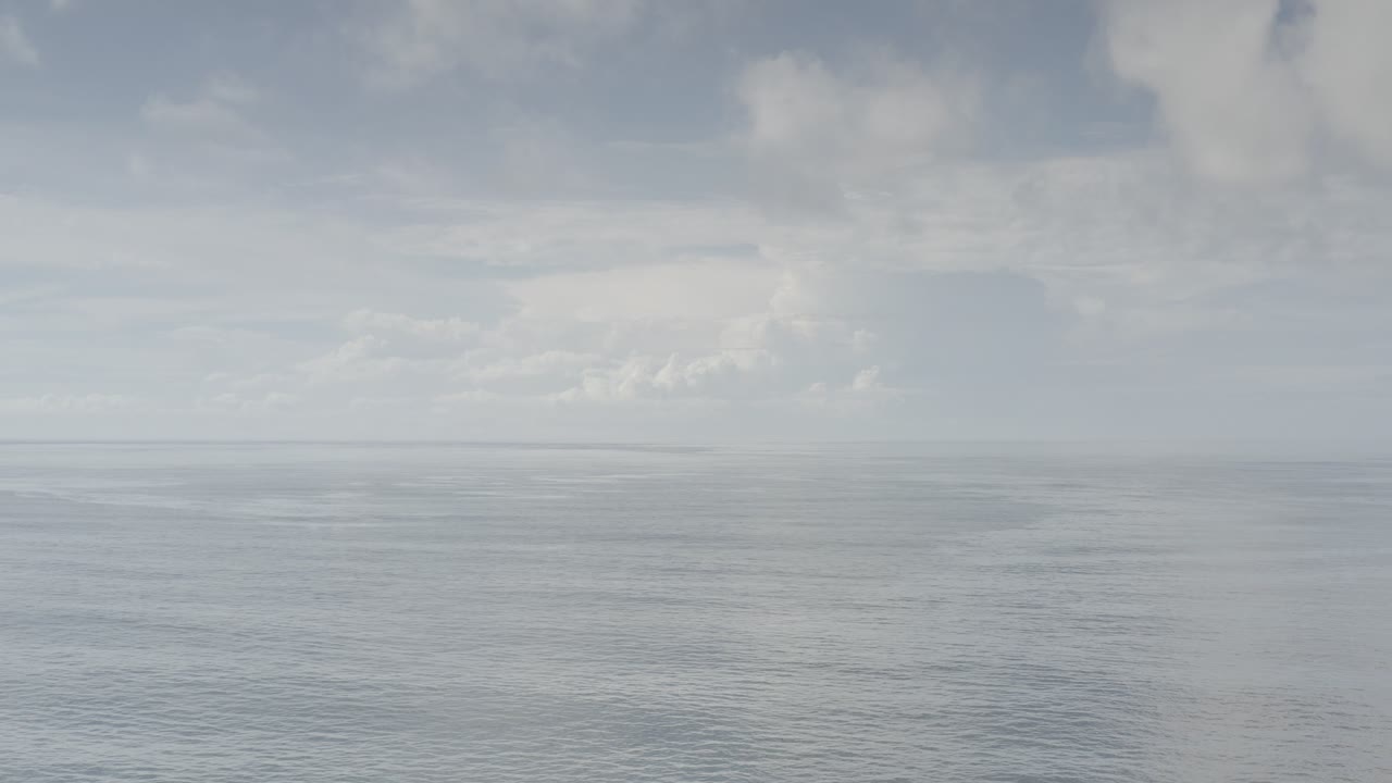 Cloud bank over calm open water