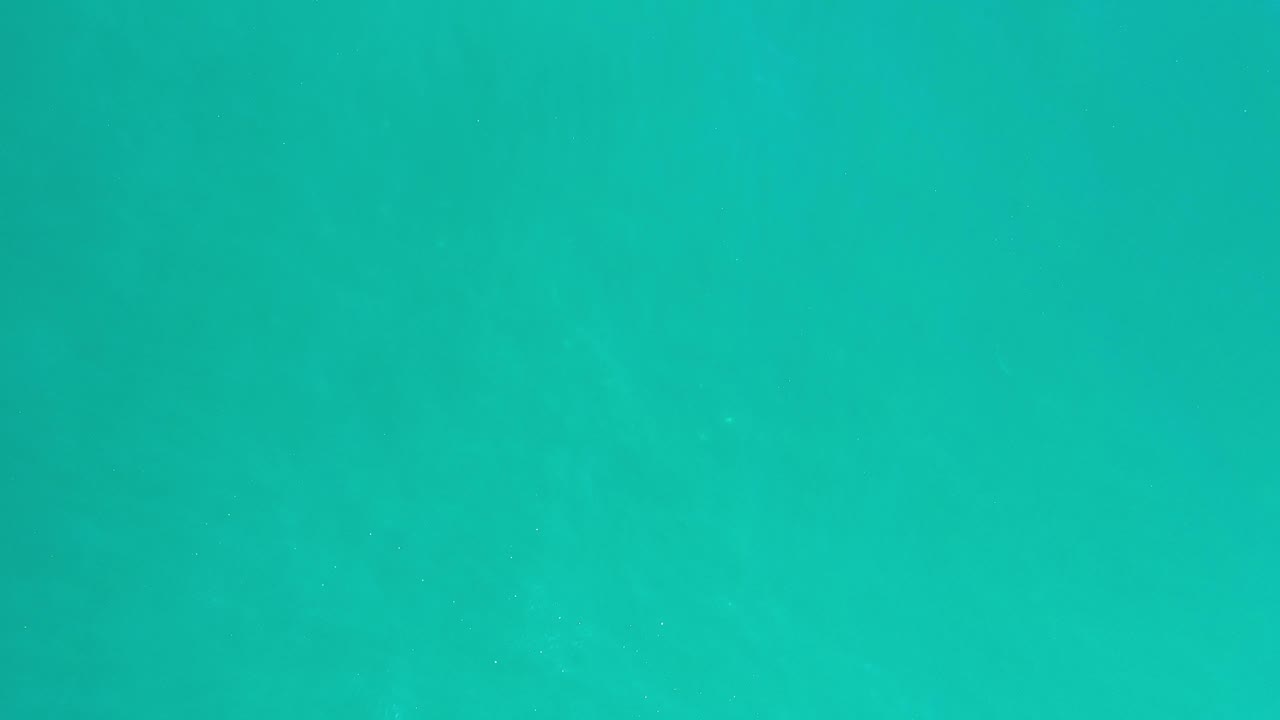 Clear emerald sea texture with small highlights
