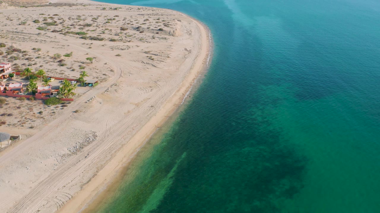 Beach point and shallow water from a high drone angle