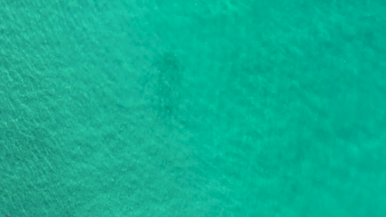 The second frame shows clear green-blue water with small wavelets spreading across the surface and no visible people or objects.