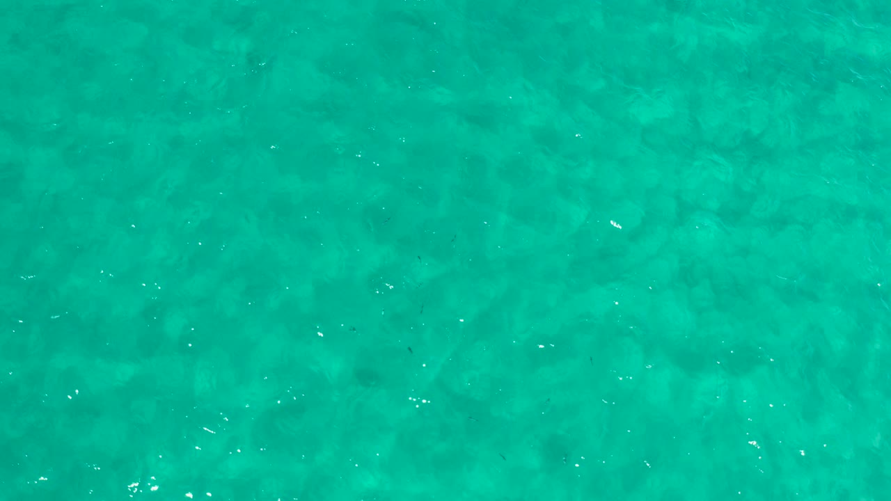 Turquoise ocean water seen from above