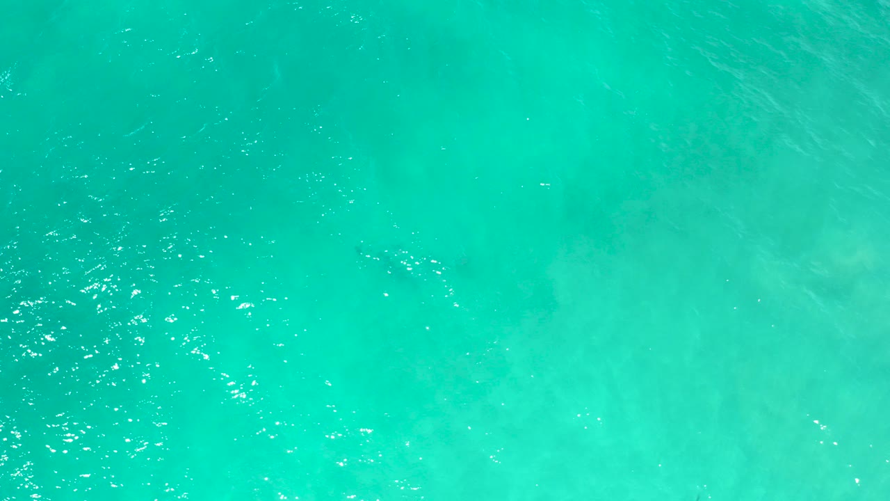 Turquoise ocean water with soft ripples