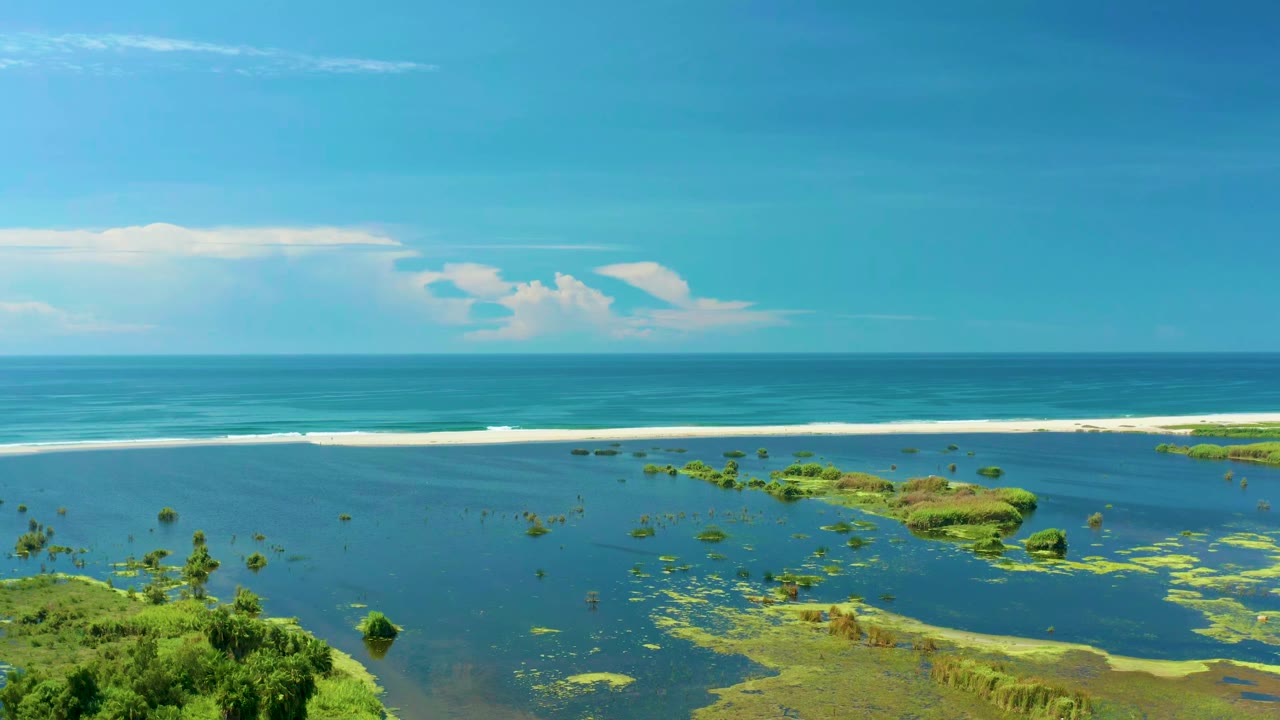Second frame shows the same San Jose Del Cabo shoreline from above, with more central green water patches, distant surf, soft clouds, and no visible people.