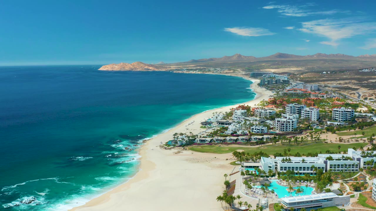 Second frame shows the Marquis Los Cabos shoreline from above, with deep blue water offshore, turquoise shallows near sand, white resort blocks, pool areas, and no visible people.