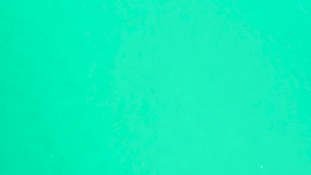 A close water-only view shows turquoise color and faint mottled patterns in the third frame, with no visible people, land, or objects.