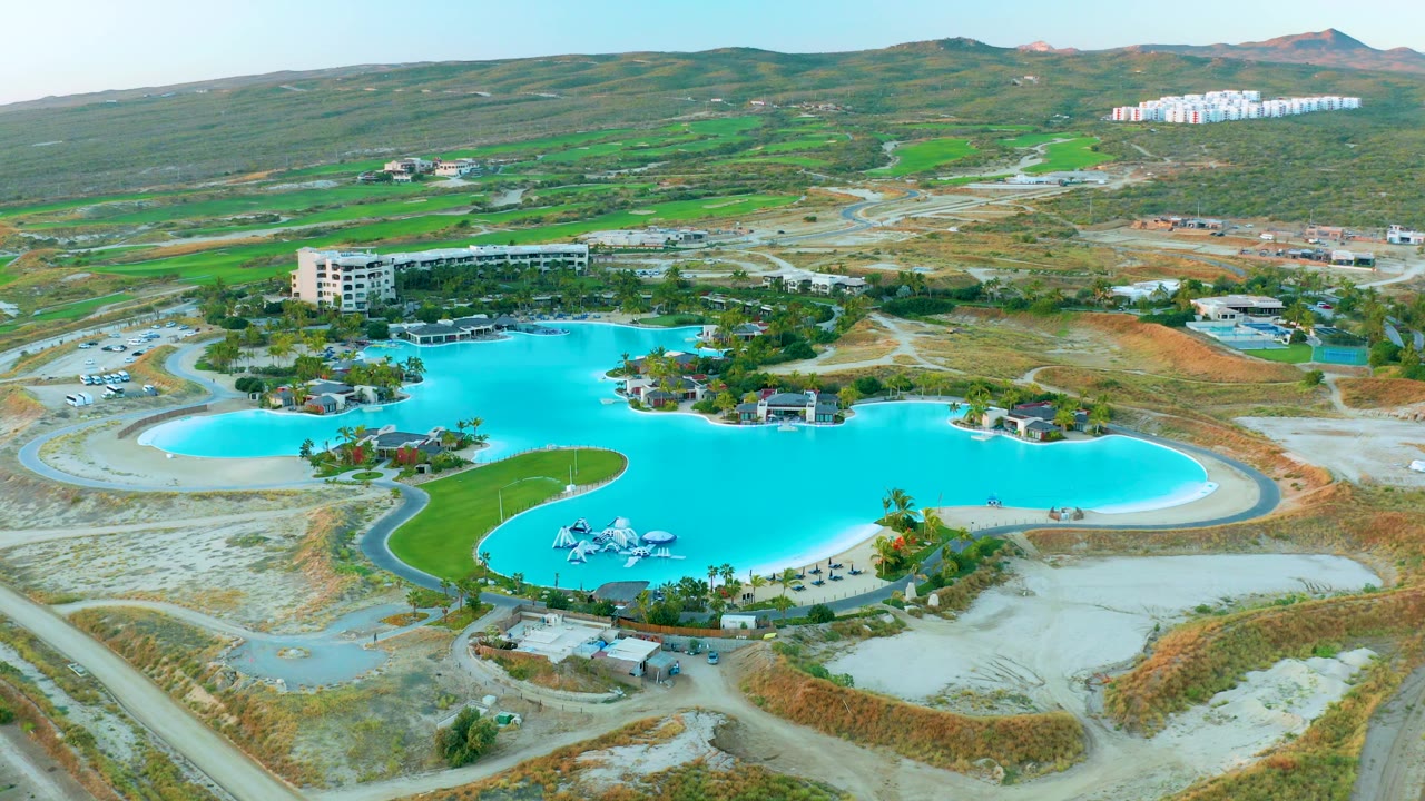 Aerial pool and construction roads in an arid landscape