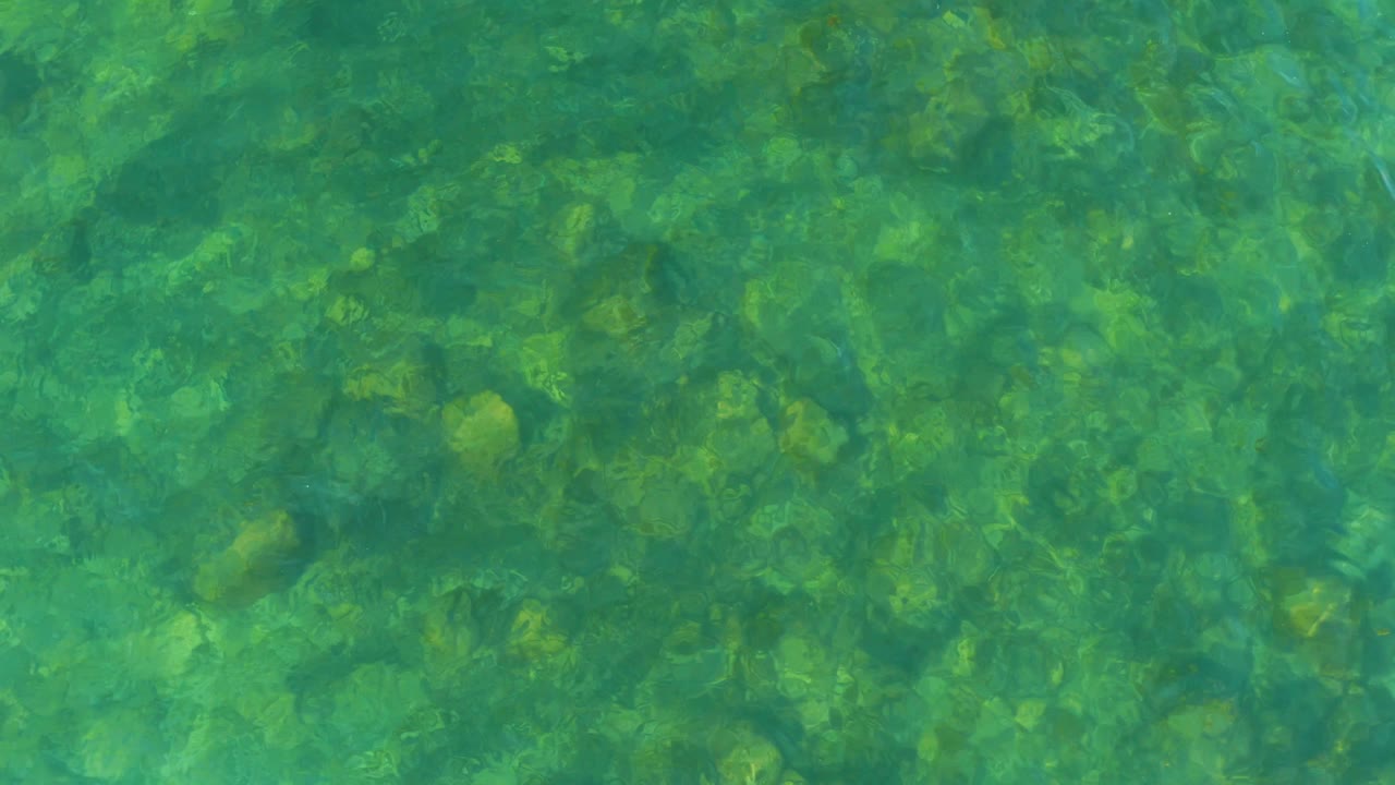 Rippling shallow water with submerged pebbles