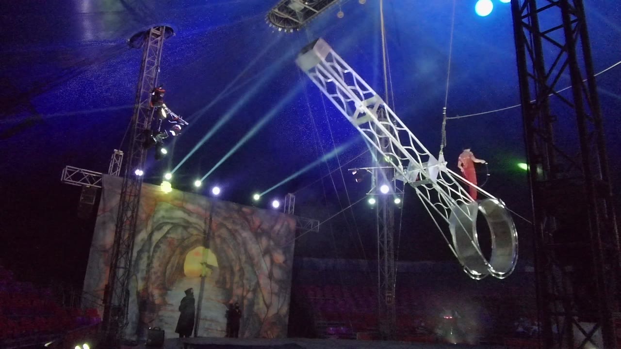 White truss angled down with ring at the lower right