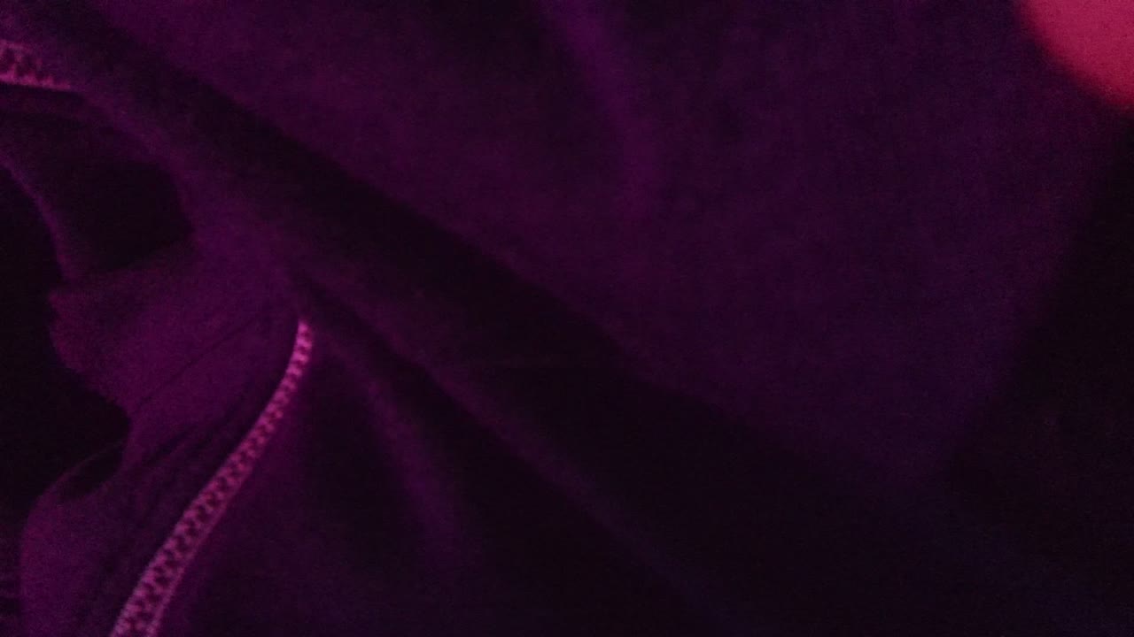 Purple fabric fold and zipper track in close-up
