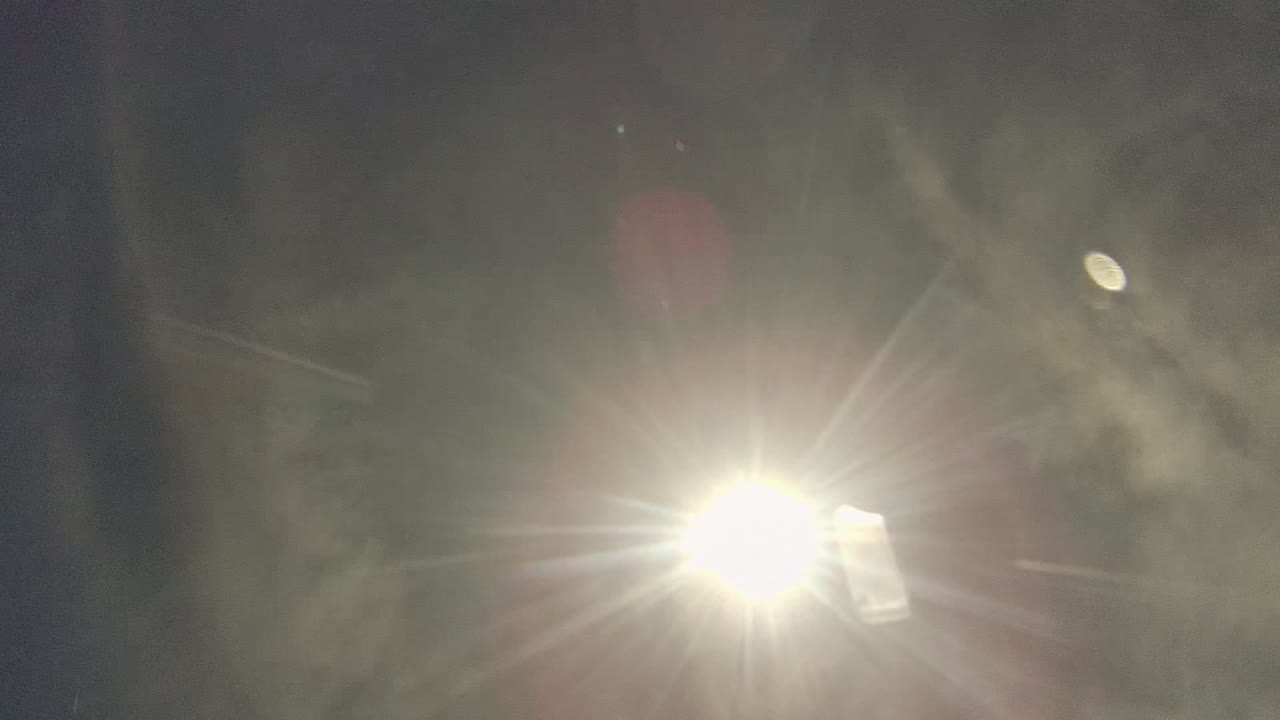 Bright sun glare shines above the water surface in Cabo Pulmo, Baja California Sur, Mexico, with no visible people.