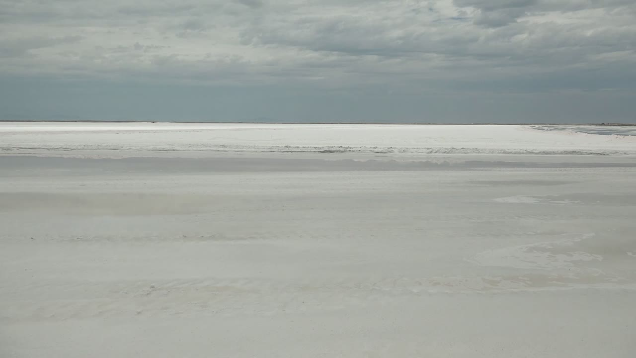 White ice field with distant low horizon