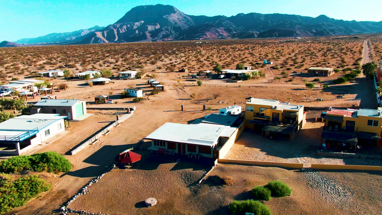 Desert homes and open lots seen from above