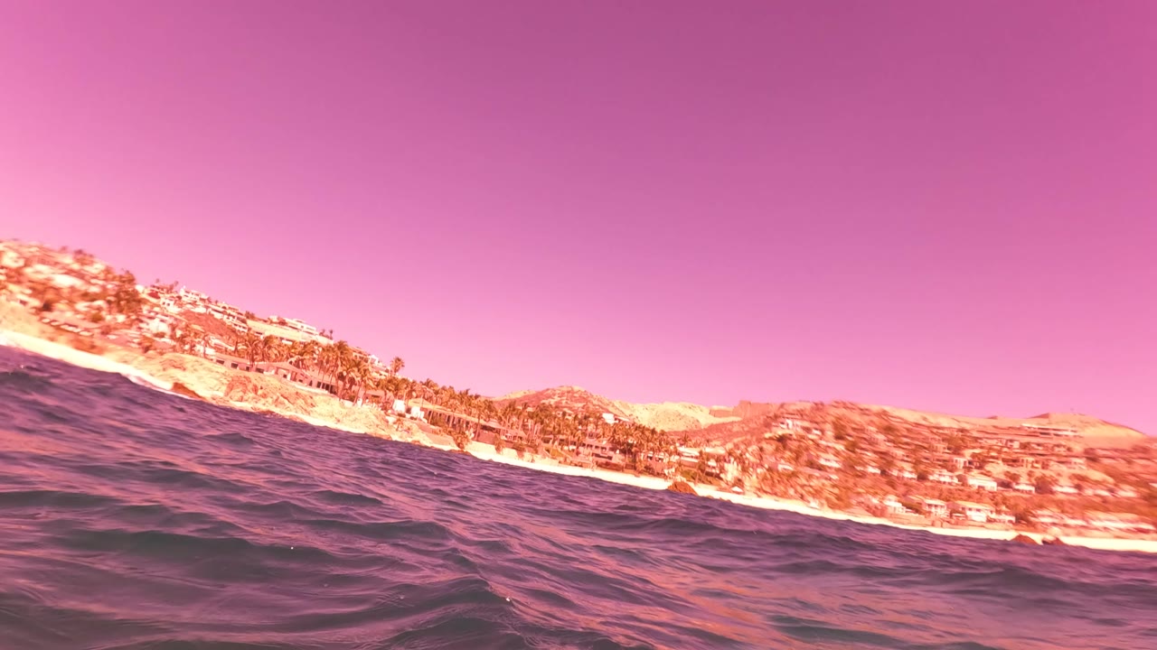 Tilted waterline view of coastline and hills