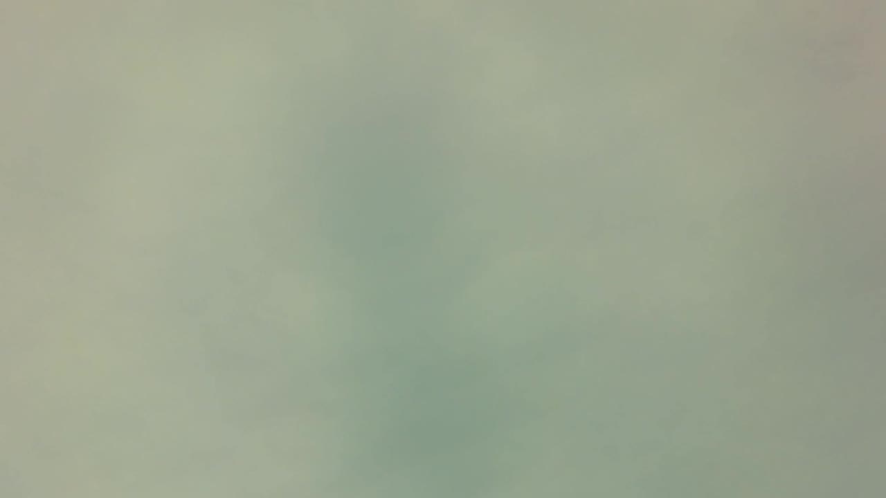 Murky green underwater frame with soft color gradients