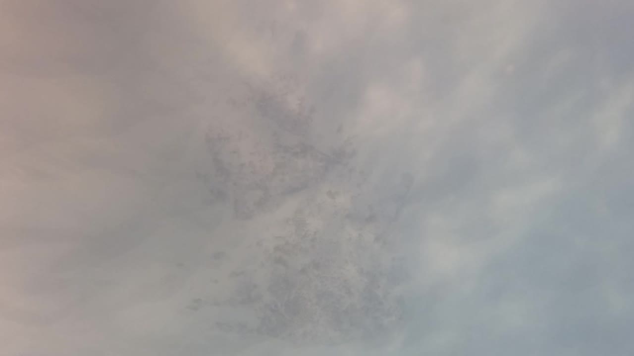 A second underwater frame in San Jose del Cabo shows pale cloudy water and darker suspended particles, with no fish or people visible.
