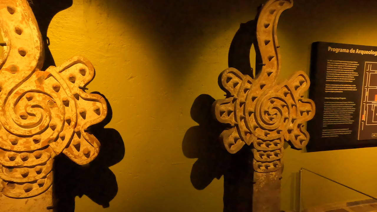 Close view of decorative carvings on a museum wall