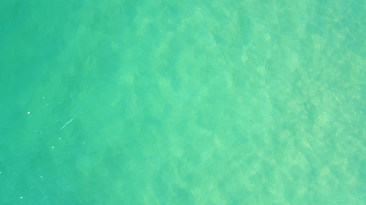 Clear blue green water in Campestre San Jose Del Cabo BCS Mexico shows soft ripple lines and pale underwater texture, with no visible people.