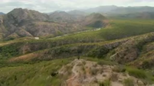 CABO PULMO BCS MEXICO-2024: Mountains With A Winding Road In The Middle Of Them